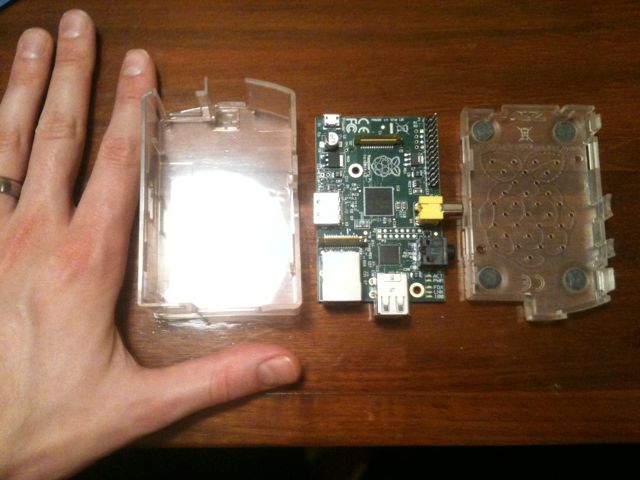 Raspberry Pi and case with
my hand for scale